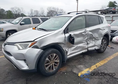 2016 Toyota Rav4 Hybrid Xle z USA, uszkodzony, nr VIN JTMRJREV1GD031063